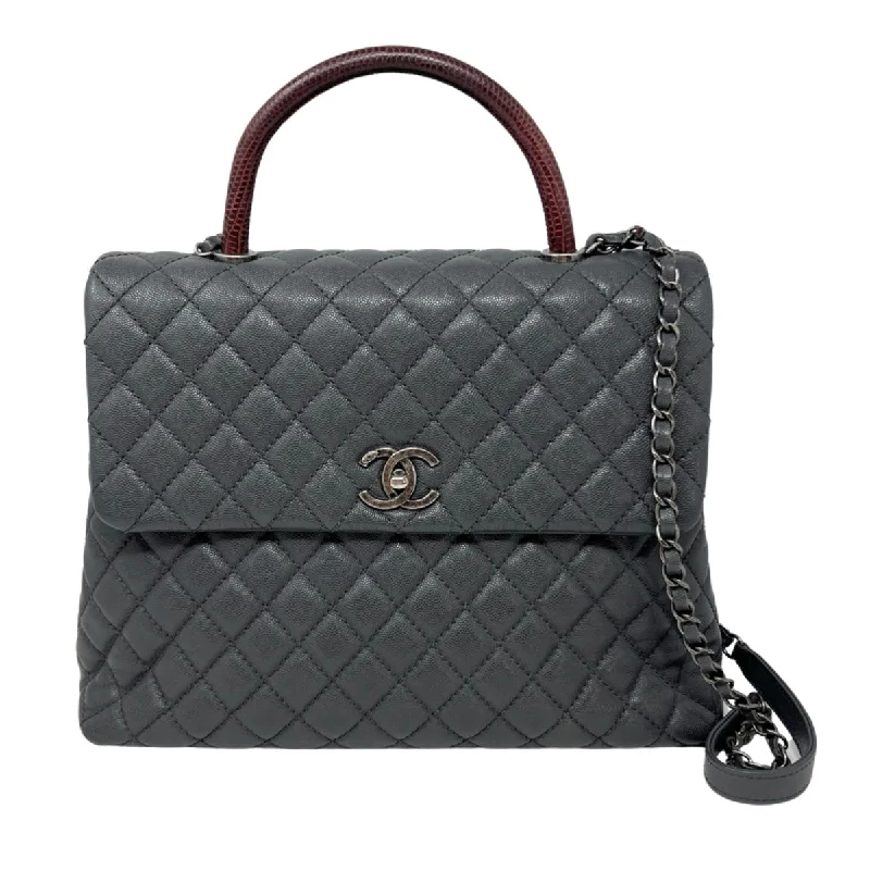 Chanel Quilted CC Handle Bag